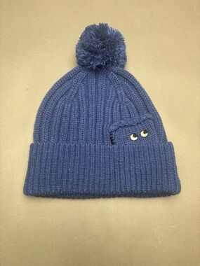 Anya Hindmarch X Uniqlo Blue Ribbed Pom-Pom Beanie with Peek-A-Boo Eye Detail